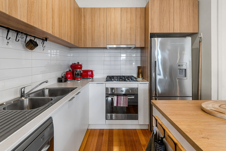 Private kitchen, Charming Retro Townhouse in Vibrant Coburg, Melbourne