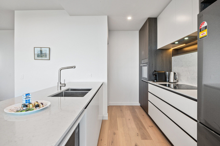 Private kitchen 2, Stylish City-view Apartment With Amenities, Melbourne