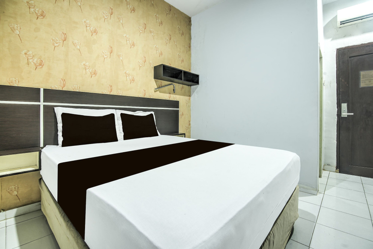 Room 5, Hotel O Makassar near Mall Panakukang formerly Hotel Lucky Inn Makassar, Makassar