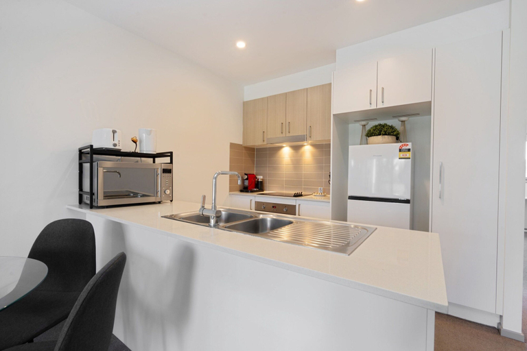 Private kitchen 5, Elegant 2-bed Apartment With Balcony, Canberra