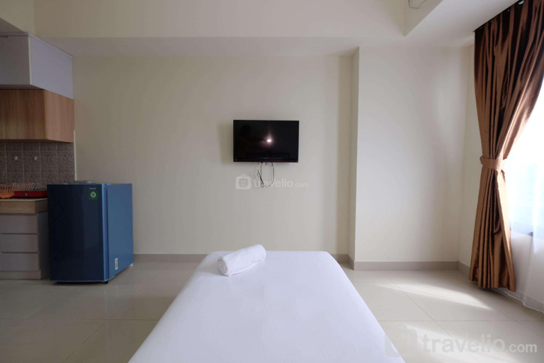 Others 3, Warm Cozy Studio at Evenciio Apartment By Travelio, Depok