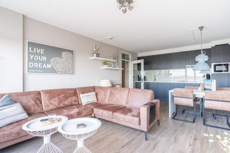 Living room 1, 4-person apartment with island view, Texel