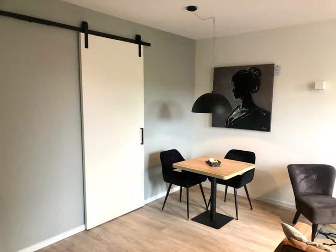 Dining 3, Lodge with view of the church and dunes, Veere