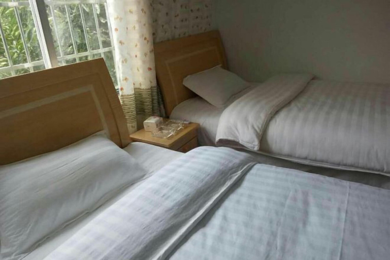 Bedroom 3, Fenggang Luosan Inn, Zunyi