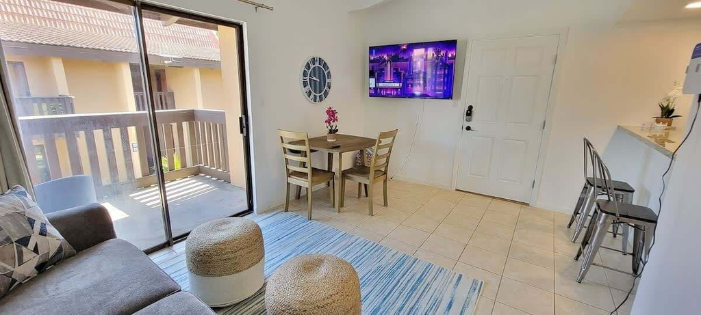 Living area 5, Tiki 1 Bedroom Home by RedAwning, Cameron