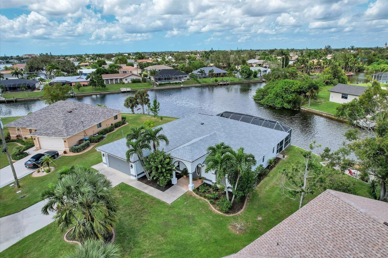 Exterior 5, Cape Coral 3-Bedroom Canalfront Pool Vacation Home with Dock 3 Home, Lee