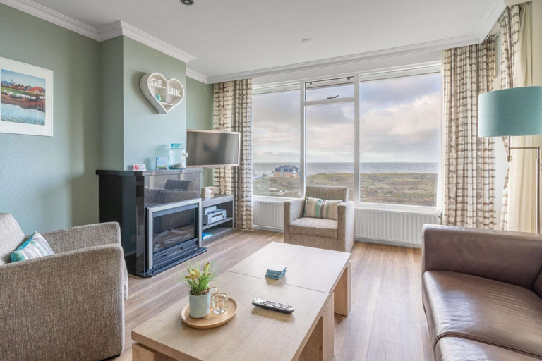 Living room 4, 4 person apartment with sea view, Texel
