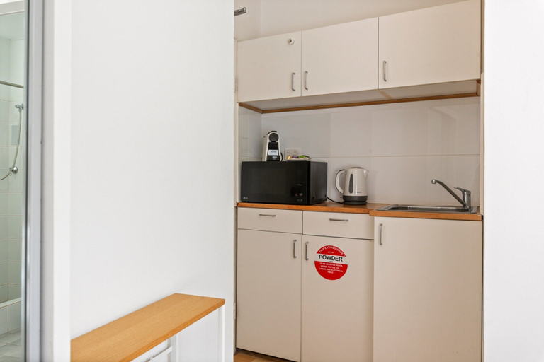 Private kitchen, Perfectly Located Studio by Rushcutters Bay Park, Sydney