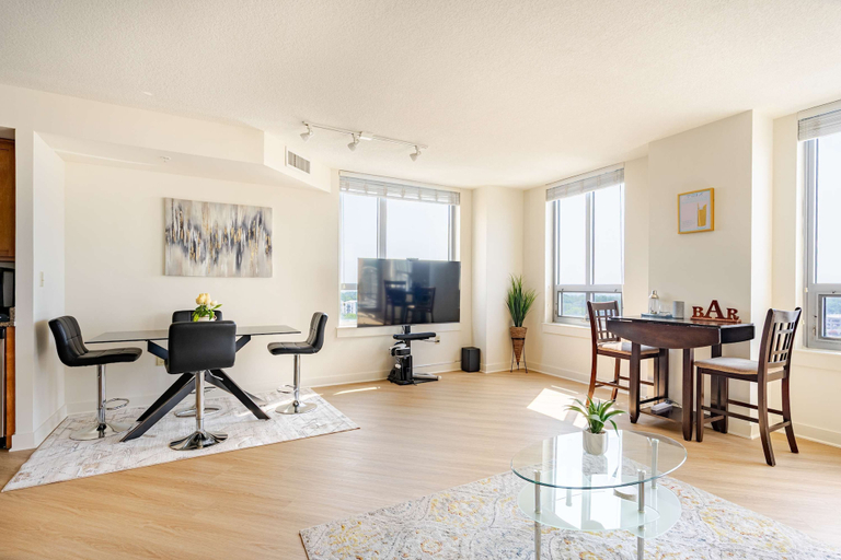Living area 5, Downtown Silver Spring Walkable Metro Skyline Balcony Corner Suite Luxe Pad, Montgomery