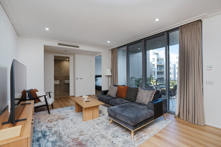 Living area 4, Modern 1-bed Unit With Pool Views and Balcony, Canberra