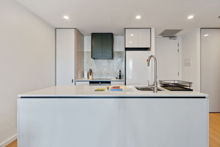 Private kitchen 3, Sleek 1-bed Canberra Flat With Gym & Sauna Access, Canberra