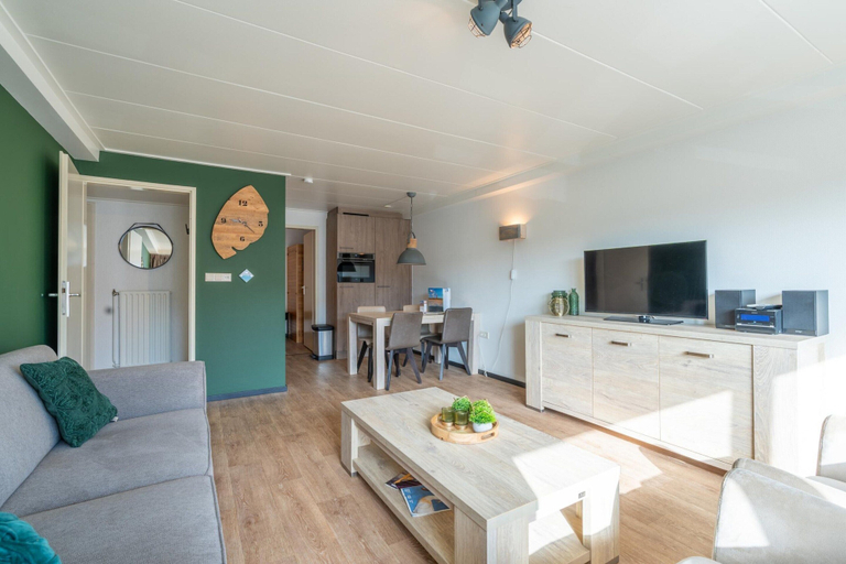 Living room 2, Comfortable and modern furnished 4-person apartment, Texel