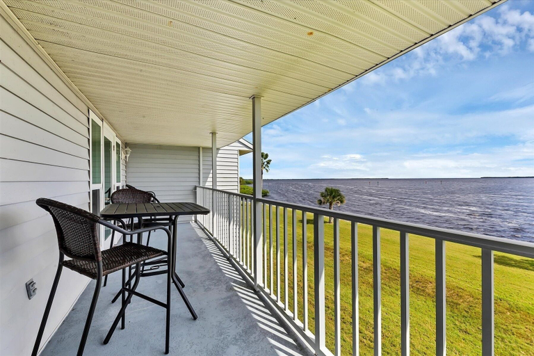 Outdoor dining 5, Myakka River 2/2 Private Waterfront Condo With Loft 2 Bedroom Condo, Charlotte