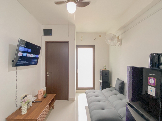 Living Room 4, Sophisticated 2BR Apartment at Transpark Cibubur by Travelio, Depok