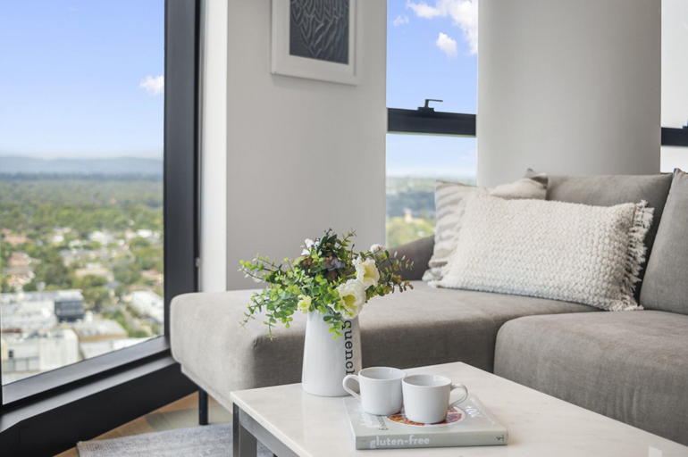 Living area 2, High-rise 3-bed Apartment With Premium Amenities, Melbourne