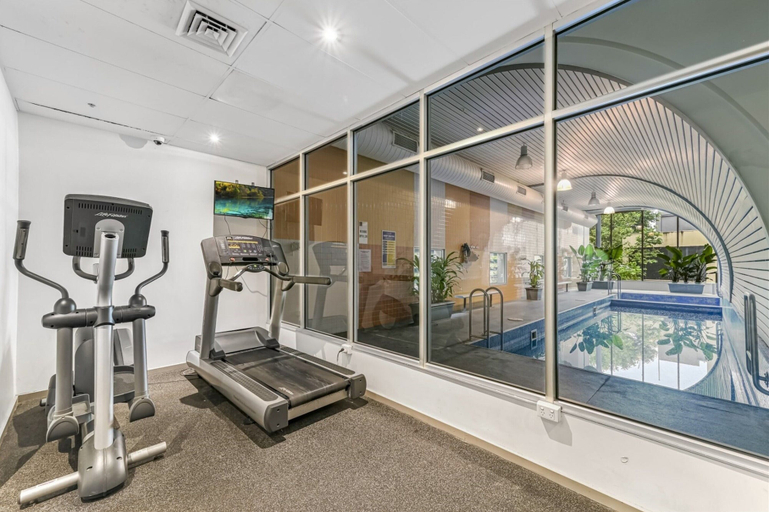 Fitness facility 3, Melbourne CBD 2BR Apt With Pool & Gym Access, Melbourne