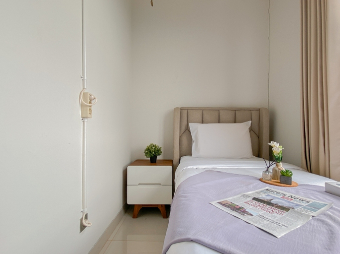 Bedroom 5, Sophisticated 2BR Apartment at Transpark Cibubur by Travelio, Depok