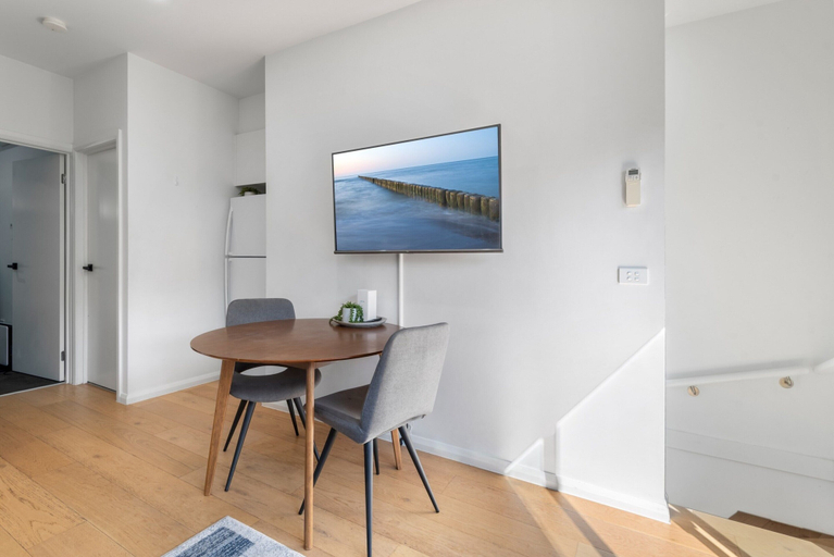 Living room 3, Comfortable 2BR Retreat With Balcony & Parking, Melbourne