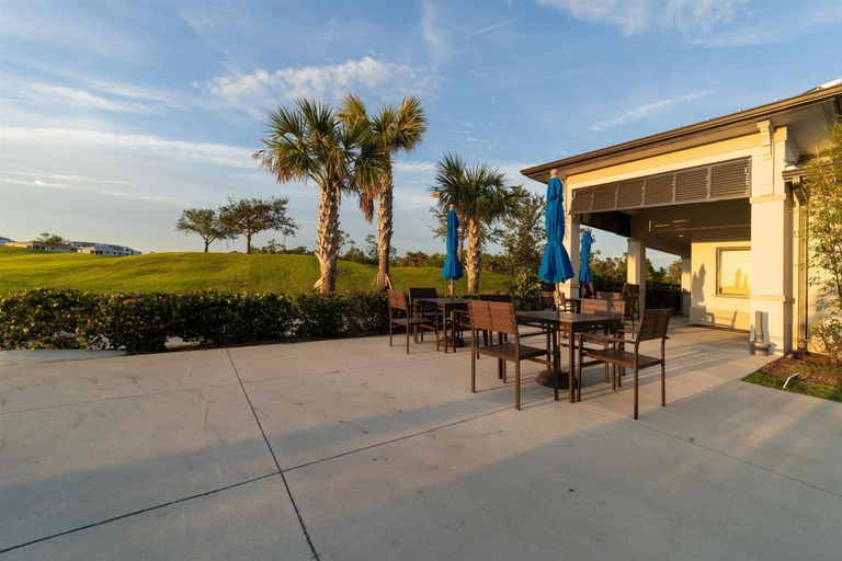 Outdoor dining 2, Private Pool Home With Golf Course View Heritage Landing Golf Resort - 30 Night Minimum 3 Bedroom Home, Charlotte