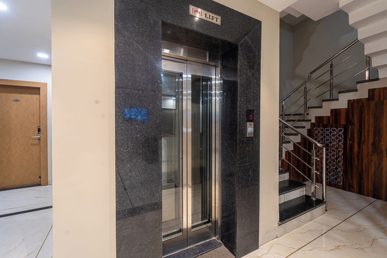 Elevator 5, Treebo Grand, Indore