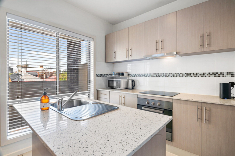 Private kitchen 5, Bright 2-bed Flat With Balcony in Kensington, Melbourne