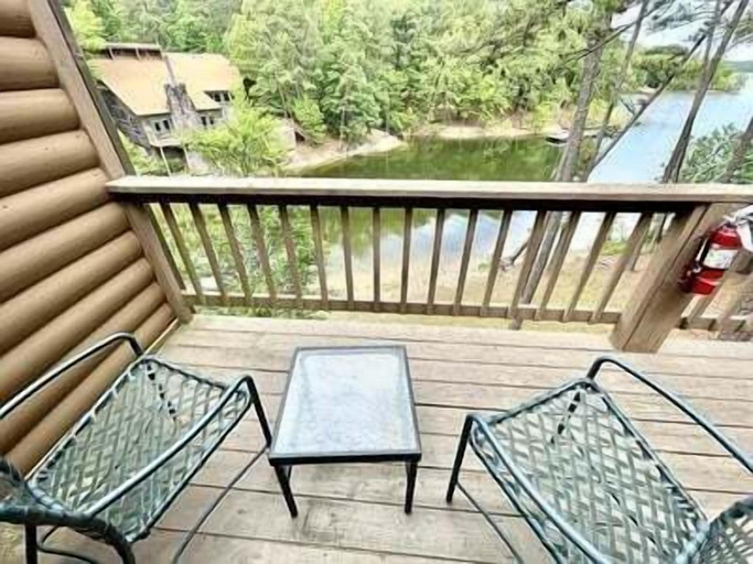 Property grounds 5, 80BPD, Four bedroom, two 1/2 bath log-sided condo with lake view , garage by RedAwning, Montgomery