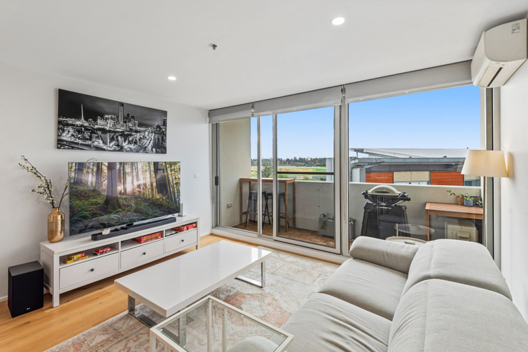 Living room 5, Sleek Kensington 2-bed With BBQ Area & Gym, Melbourne