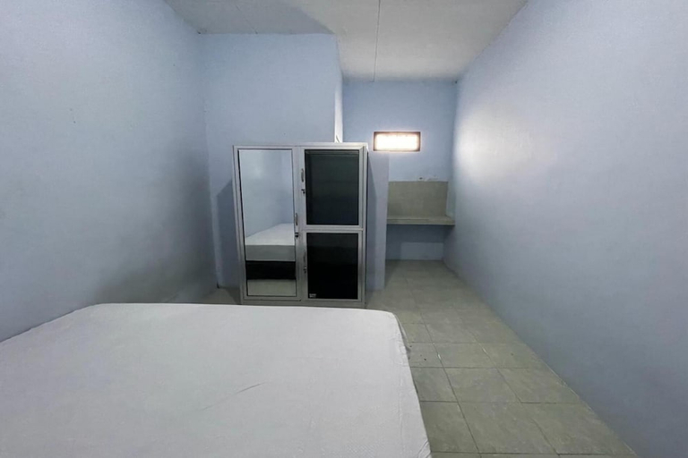 Bedroom 2, Hotel O Kost Btnompo Near SDI Bontosallang, Gowa