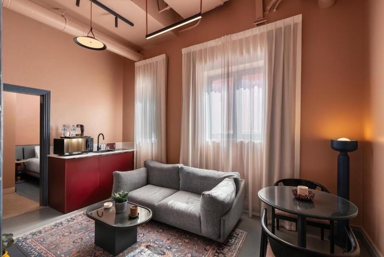 Living area 3, Brassbell grey apartments Bidair House, Qasr an-Nil