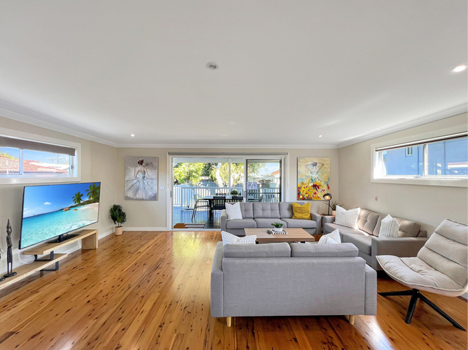 Living area 5, 3-bed Coastal Haven With Alfresco Dining & BBQ, Lake Macquarie - East