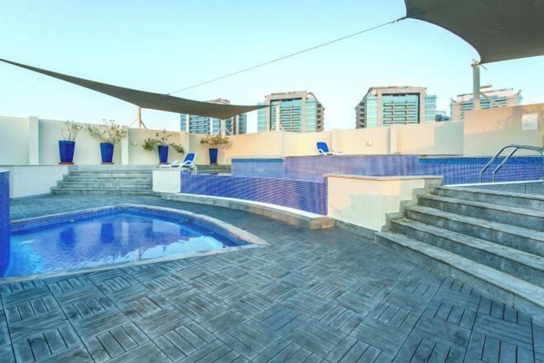 Outdoor pool 4, bnbme Luxury Al Barsha Apt near Miracle Garden, Dubai