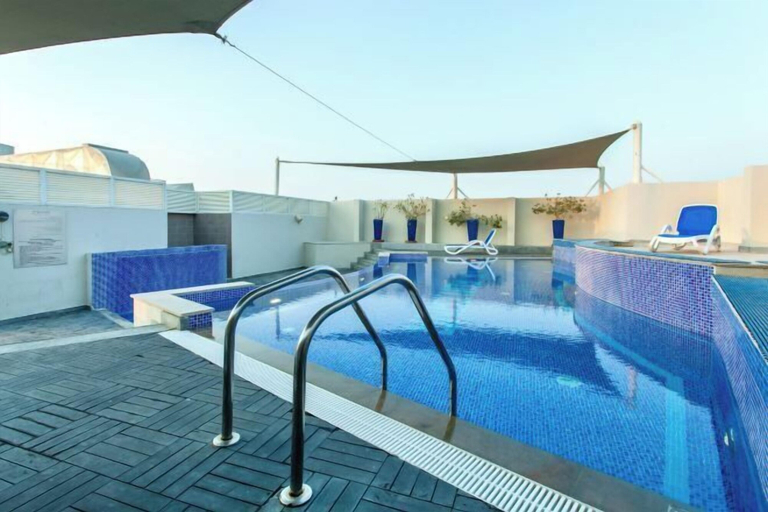 Outdoor pool 5, bnbme Luxury Al Barsha Apt near Miracle Garden, Dubai