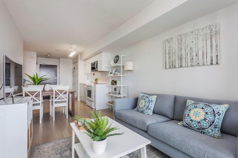 Living area 4, Breathtaking Toronto Waterfront 1+1 2BR CN Tower, Lake & City Sunset Perfection, Toronto