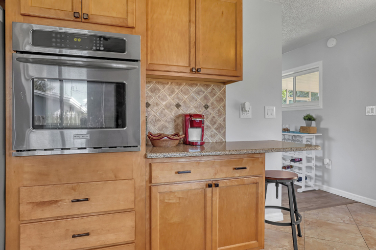 Private kitchen 2, Vibrant Coastal Cottage with Pool, Brevard