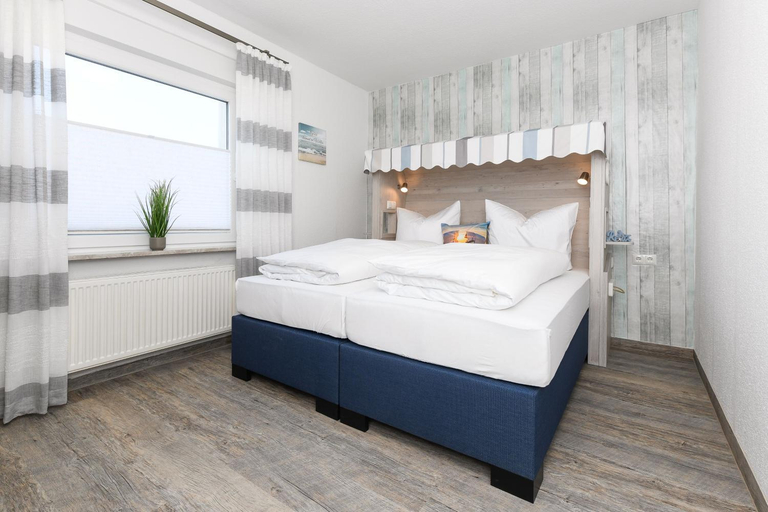 Bedroom 2, Ferienwohnungen im Haus Strandkorb, Wittmund