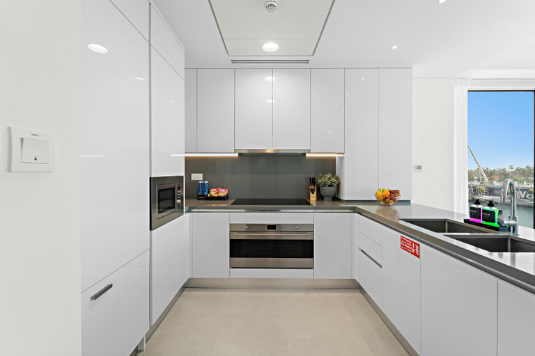 Private kitchen, 2BR M Canal Front with Full Water Views, Dubai