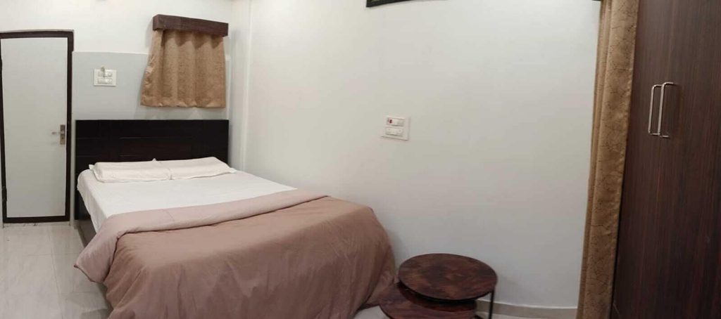 Room 4, BVR Dazzle Residency, Krishna