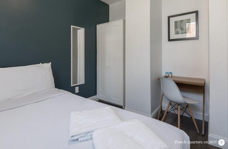Bedroom 1, Quarters on DOT by Short Term Rentals Boston, Boston