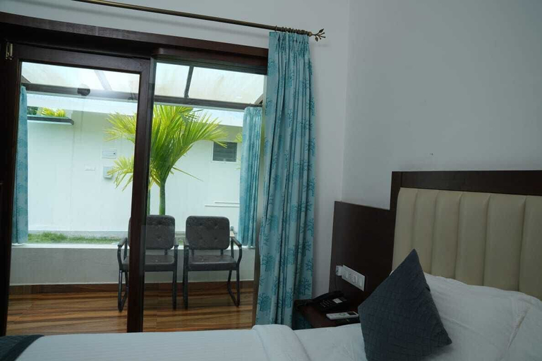 Bedroom 3, RG The Grand Haven Resort, Chikmagalur