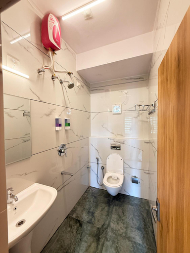 Bathroom, FLORA SUITES, Bangalore