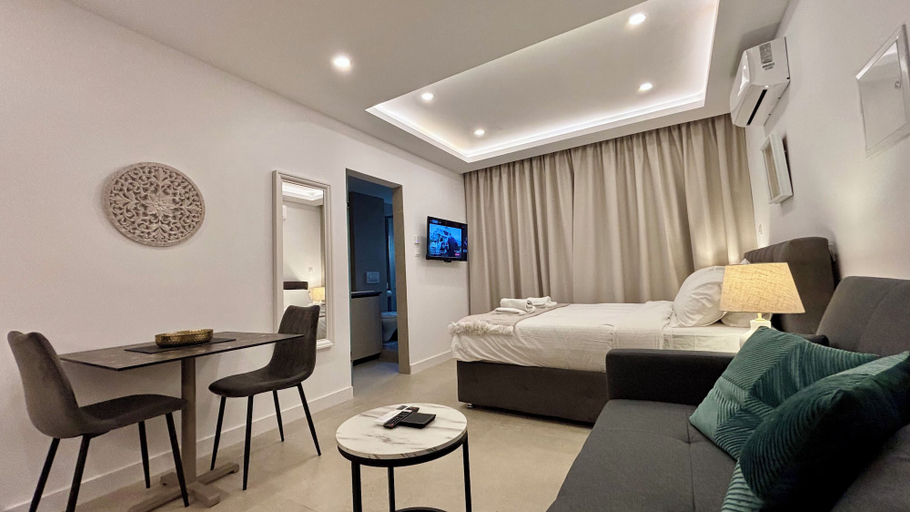 Living area, White Arches Studio Suite by TrulyCyprus