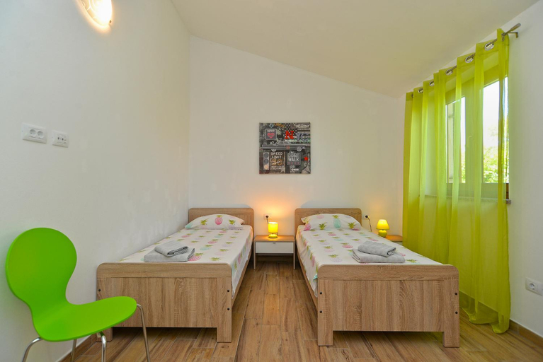 Bedroom 3, Holiday Home in Liznjan near Beach  Pool, Ližnjan