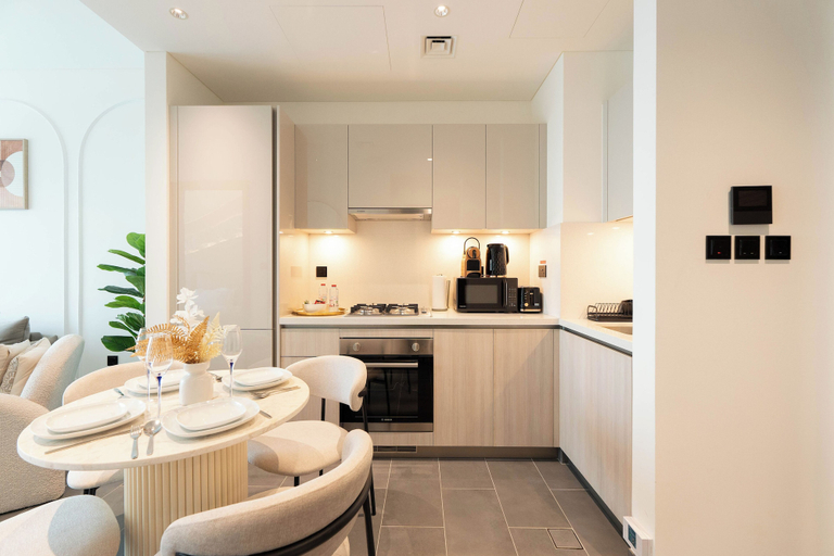 Private kitchen 4, Chic 1BR Apartment - The Crest Dubai, Dubai