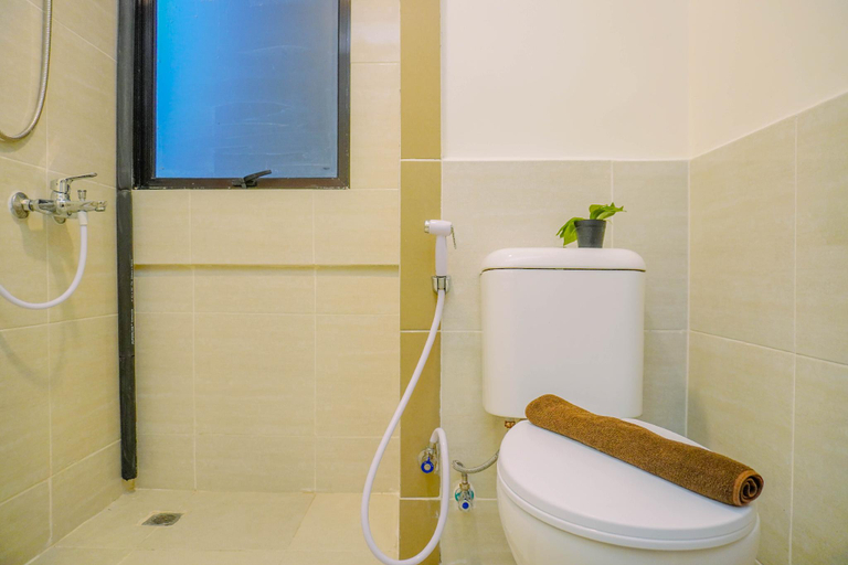 Bathroom 3, Lavish and Spacious 2BR at Meikarta Apartment By Travelio, Cikarang