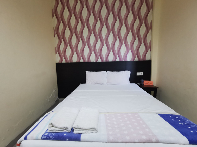 Room 4, OYO 95059 Ikon Guesthouse, East Kutai