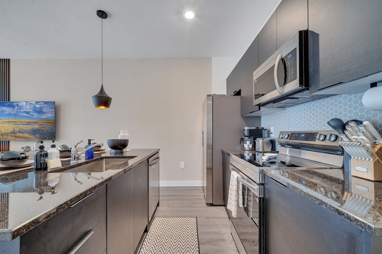 Private kitchen 3, 3BR Home Near Disney w/ Office & Fun Corner, Osceola