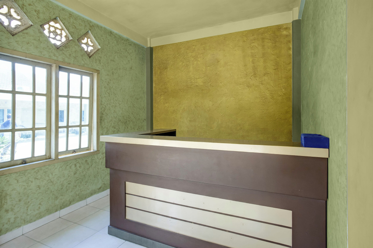Reception 5, Hotel O near Universitas Widya Dharma, Palembang