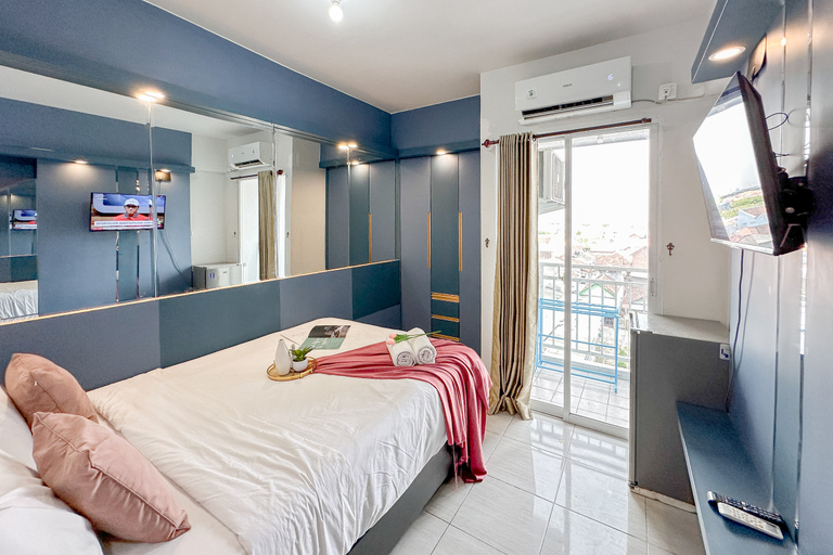 Bedroom 4, Restful Blue Studio at Suncity Residence by Travelio, Sidoarjo