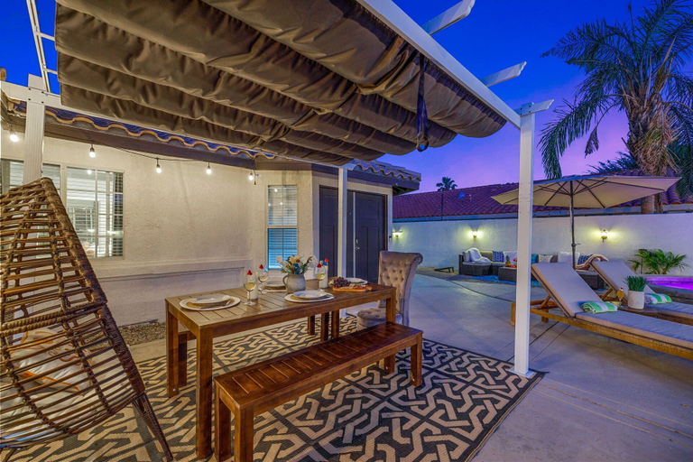 Outdoor dining 5, Desert Fun 4BR Retreat with Pool, Riverside