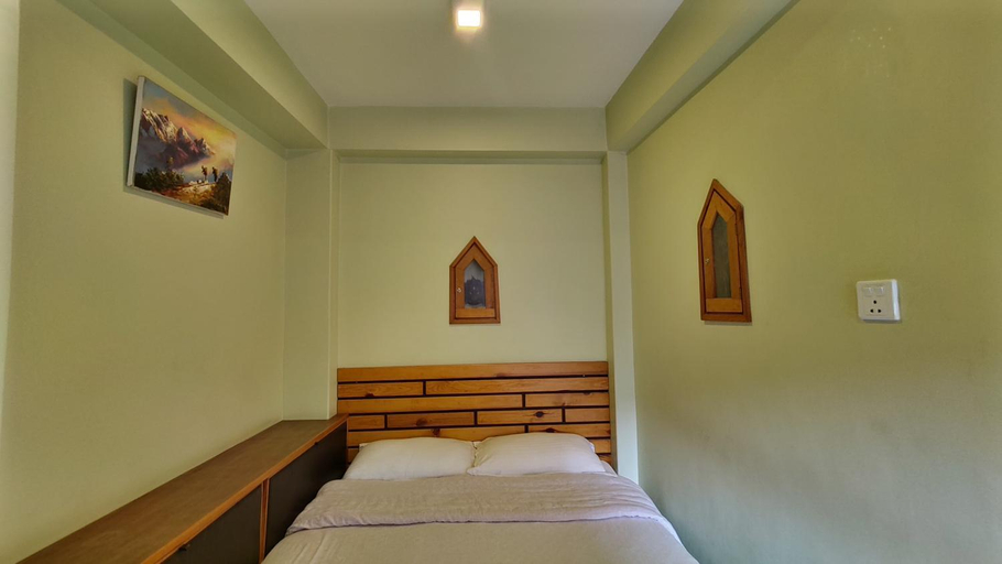 Bedroom 2, Tranquil Haven with shared kitchen access at greentara heritage home, Bagmati